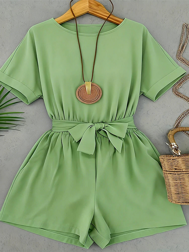 Fashionable women's light green romper, short sleeves, round neck, bow waist belt, lightweight fabric, casual everyday wear